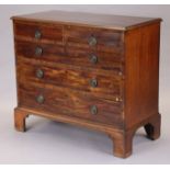 A George IV inlaid mahogany chest fitted two short & three long graduated drawers with later brass