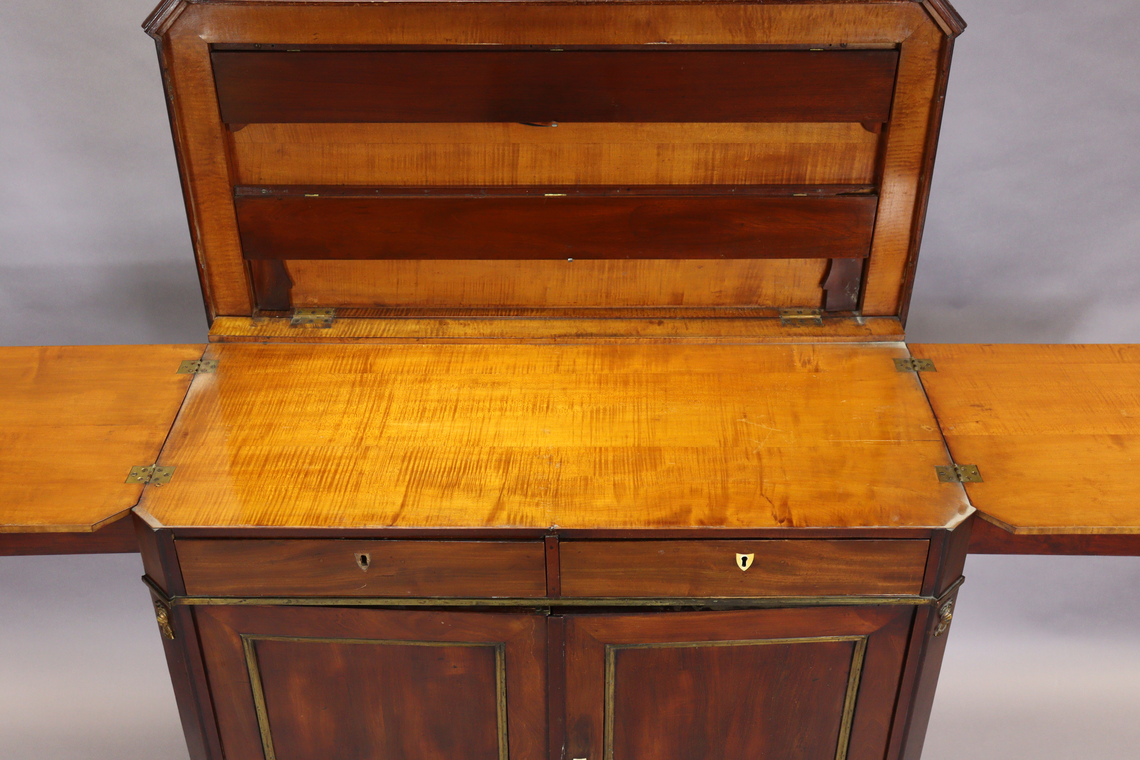 An early 19th century French mahogany buffet, the hinged top enclosing folding shelves, two frieze - Image 8 of 14