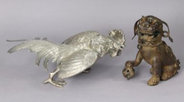 A Chinese cast-metal model of a cockerel, 34cm long x 15cm high; & a Chinese bronze foo-lion censer,