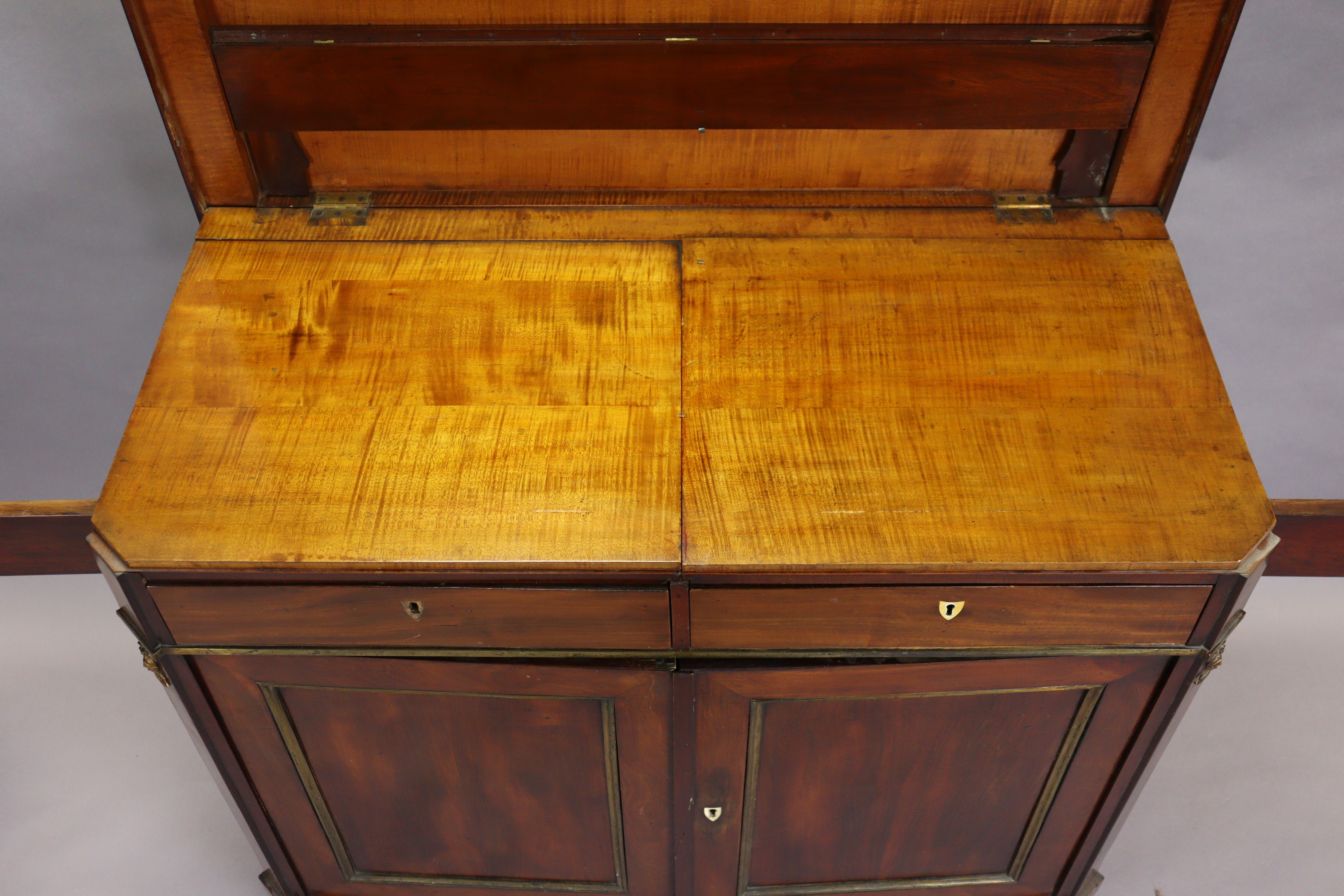 An early 19th century French mahogany buffet, the hinged top enclosing folding shelves, two frieze - Image 11 of 14