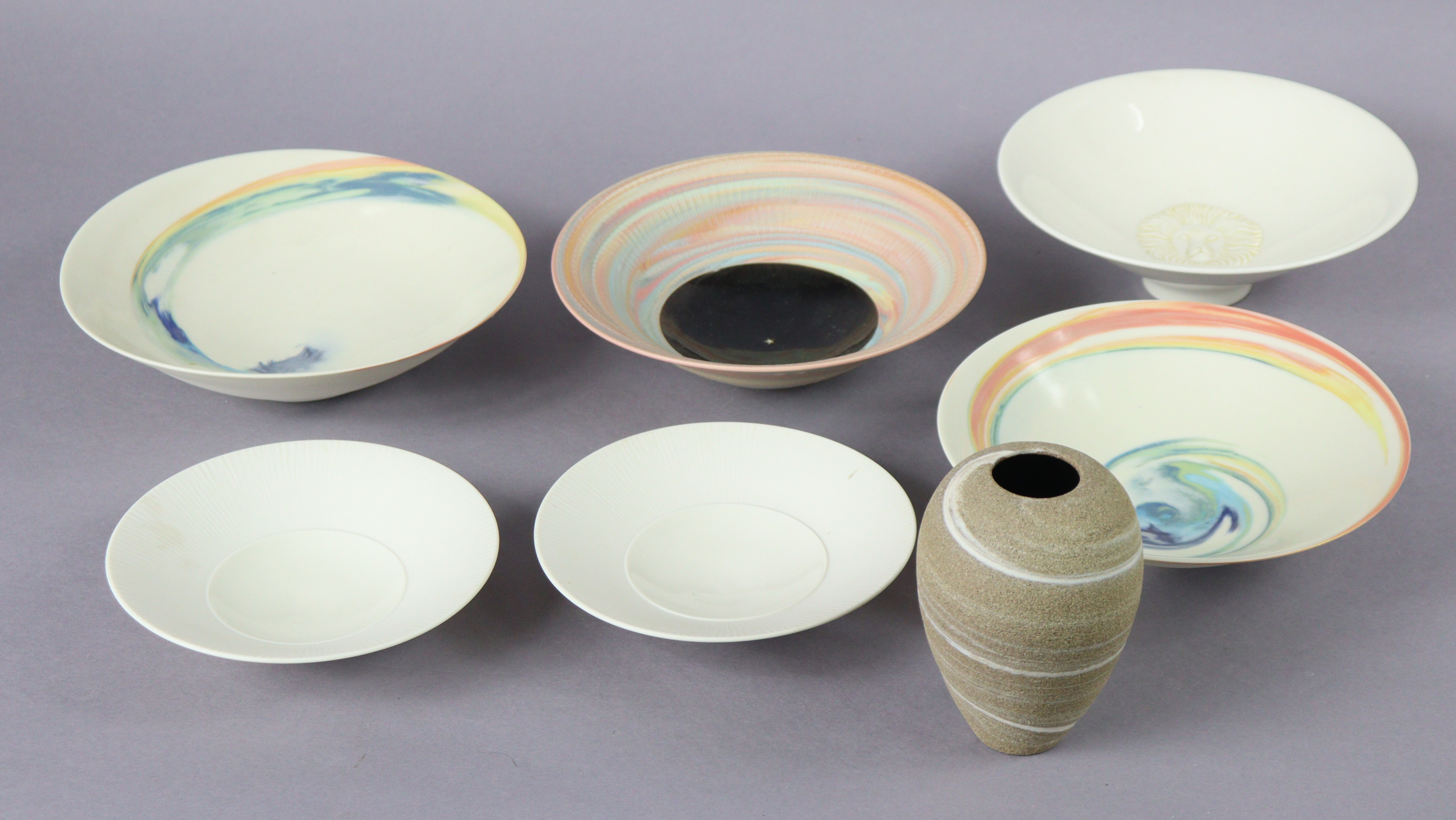 Six various Stephen Maguire studio pottery conical bowls, three with marbled glaze, 19.5cm dia., one