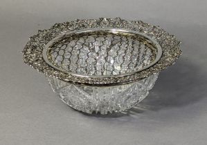 A cut glass circular deep bowl with Canadian silver wide rim-mount by Birks of cast & pierced