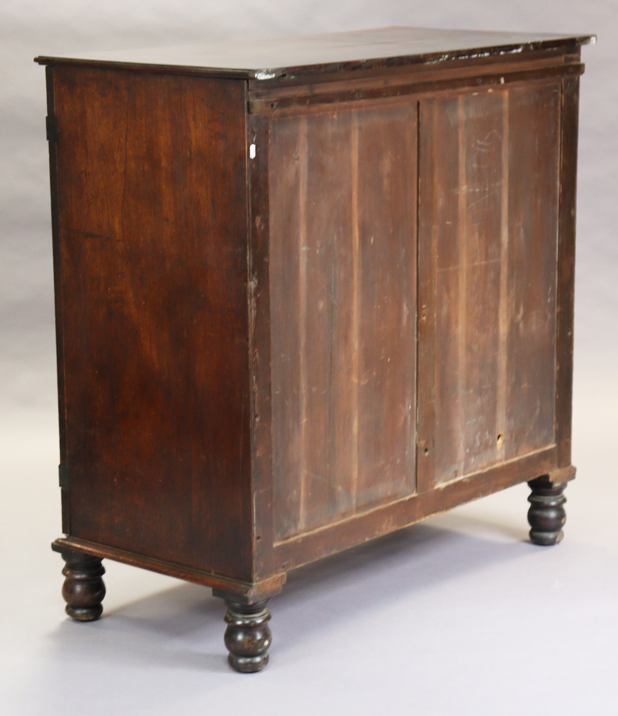 A Georgian mahogany hall cupboard, enclosed by a pair of fielded panel doors with turned handles, - Image 3 of 3