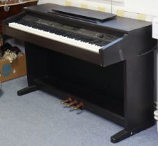 A Yamaha “Clavinova” electric keyboard in an ebonised-finish case, & on a stand, 139cm wide x 83cm