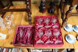 A set of six Schott (German) cut-glass wines, 15.25cm high; a pair of Doulton cut-glass champagne