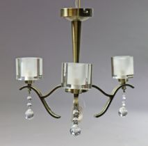 A 1970s style modern silvered-metal three-branch ceiling light fitting fitted glass shades, & hung