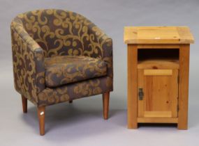 A pine bedside cabinet with an open recess above cupboard enclosed by a panel door, 48cm wide x 68cm