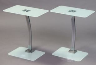 A pair of frosted-glass rectangular two-tier bedside tables each on a silvered-metal shaped centre