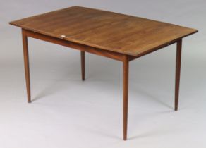 A mid-20th century Greaves & Thomas teak extending table with a pull-out action, centre leaf, & on