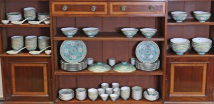 A modern Chinese famille rose extensive part dinner service, painted in famille verte enamels.