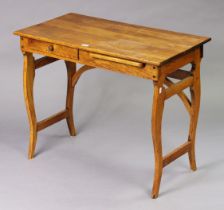 An oak campaign-type writing/side table with rectangular top, fitted frieze drawer to the left-