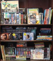 Various assorted books, DVDs, calendars, etc., including “Space 1999”, “Lost In Space”, “