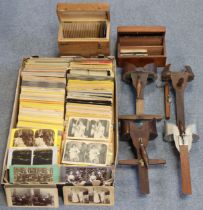 Four various stereo card viewers; & a quantity of assorted stereoview cards.