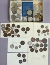 A small collection of British copper & silver coins, sorted into envelopes by reign, Charles II to