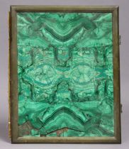 A vintage malachite book cover with a brass border, 29.5cm x 23.25cm, w.a.f.