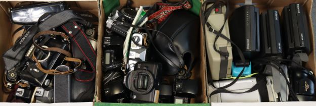 Four Polaroid cameras; together with various other cameras & accessories.