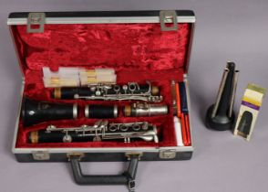 A Boosey & Hawkes ebonised “Regent” clarinet with chrome-plated keys, 67cm long, complete with