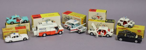 Seven Dinky die-cast scale model police vehicles “Ford Panda car” (No. 270), “Ford Zodiac car” (