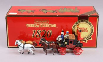 A Matchbox Models of Yesteryear special edition scale model of a “Passenger Coach & Horses c. 1820”,