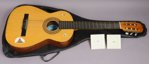 A Classico (Spanish) six-string acoustic guitar, with case.