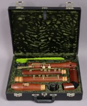 A Mollenhauer Knick great bass wooden recorder with plated keys, cased.