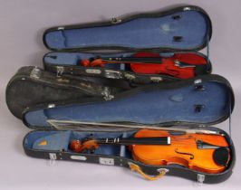 Three violins, each with case; & another violin case.