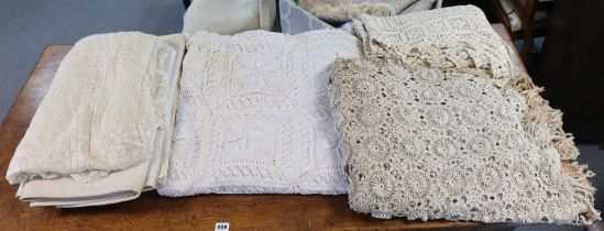 Five early 20th century & later crochet bedspreads three linen table covers; & various vintage