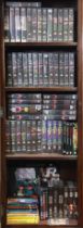 Various assorted DVDs, video cassettes, etc., including “Star Wars”, “Battlestar Galactica”, “Blakes
