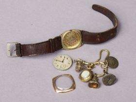 A vintage 9ct gold-cased ladies’ wristwatch with a leather strap; & four metal seals.