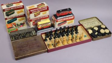 A set of De La Rue & Co’s Bezique playing cards, boxed; a part set of chessmen; five Atlas die-