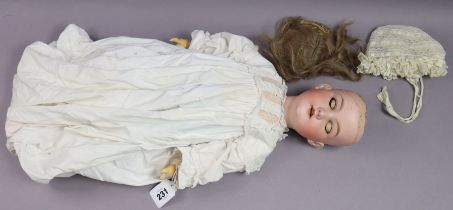 An Armed Marseille bisque head girl doll (390n, A.8M) with blue sleeping eyes, open mouth, &