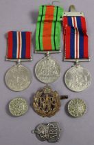 Service Medals: a Second World War pair, Defence & War medals, mounted; another War medal, all un-