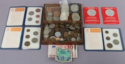 A quantity of British & foreign coins; GB commemorative crowns; coin sets, etc.