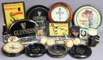 Two “Guinness” wall clocks; two ditto pub trays; two ditto ashtrays; & various other items of “