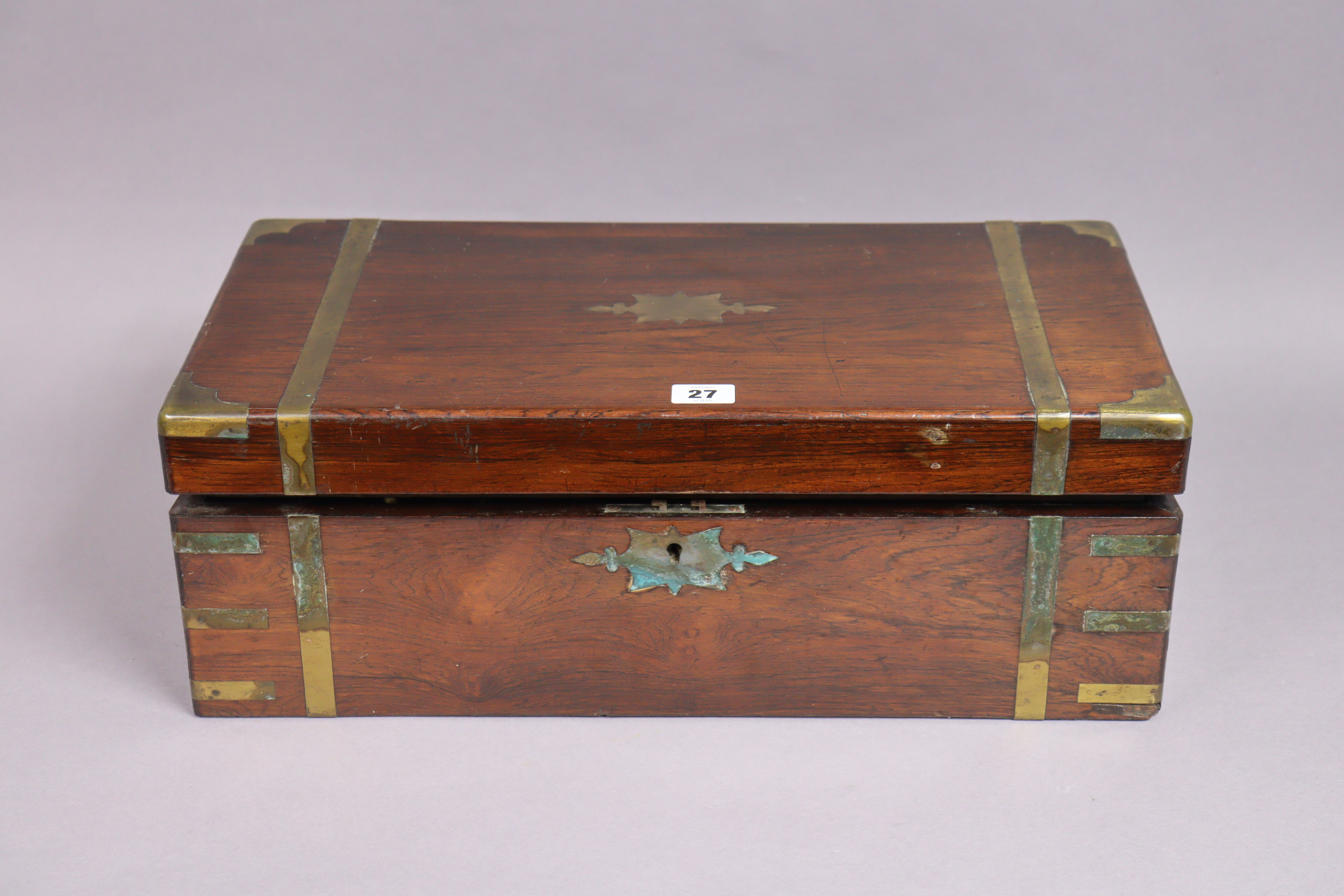 A 19th century large rosewood writing slope with brass mounts & fitted interior, 50cm wide.