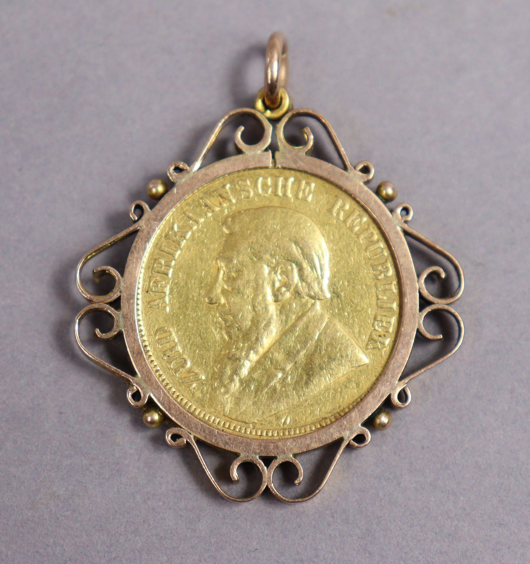 A South African gold 1 Pond coin, 1898; forming a pendant with 9ct. scroll mount. - Image 2 of 2