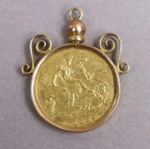 A Victorian gold Half-Sovereign, 1893; forming a pendant with 9ct. scroll mount.