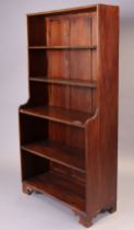 A teak five-tier tall standing open bookcase, with shaped end supports & moulded edge, 89.5cm wide x
