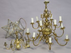 A Dutch-style brass-finish twelve-branch electrolier, 77cm wide x 64cm high; together with two other