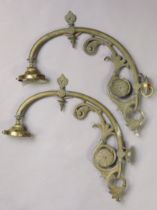A pair of Edwardian brass wall-mounted gas light wall brackets, 41cm long.