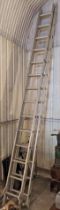 An aluminium telescopic ladder; together with an extending ladder; & two ramps.