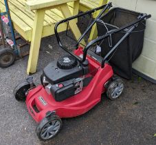 A Mountfield “RS 100” petrol-driven lawnmower with grass box.