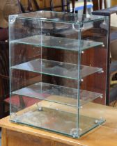 A vintage shop’s glass counter-top display cabinet fitted three plate-glass shelves, 45.25cm wide