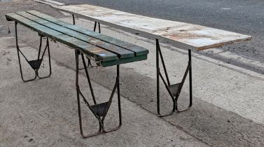Two painted wooden potting tables both on fold-away iron legs, 180cm & 209cm long.