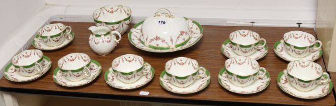 A crescent china floral decorated twenty-one-piece part tea service, part w.a.f.