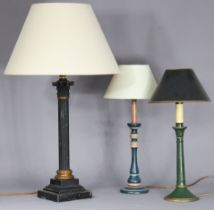 An early 20th century ebonised Corinthian column table lamp, cm high; & two modern turned wooden