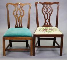 Two 19th century mahogany Chippendale-style dining chairs, each with pierced splat-back and padded