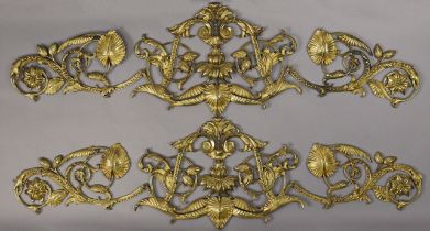 A pair of late 19th century gilt-brass pierced wall applique of foliate scroll design, each with