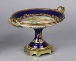 A late 19th century Servres-style blue-ground comport with gilt-metal mounts & painted romantic