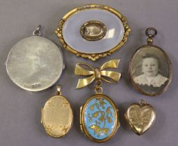 A Victorian oval opaline brooch with plaited hair locket to centre, in gilt metal mount (with